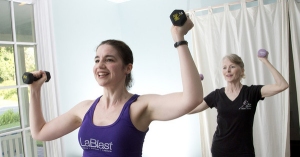 Group fitness - Jess and Grace work with weights